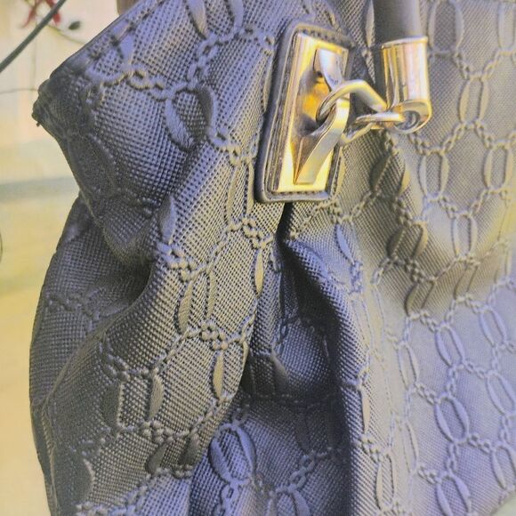 Coofit Elegant Black Satchel with Gold Accents and Curved Handles - Picture 10 of 15